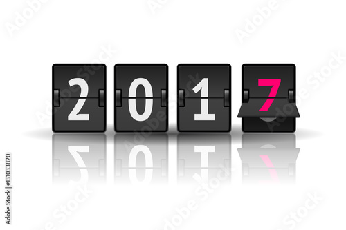 New Year 2017 concept. Flip clock changing fron 2016 to 2017. Analog scoreboard flip calendar changes to new year. Digital countdown timer with 2017 numbers represents time going forward