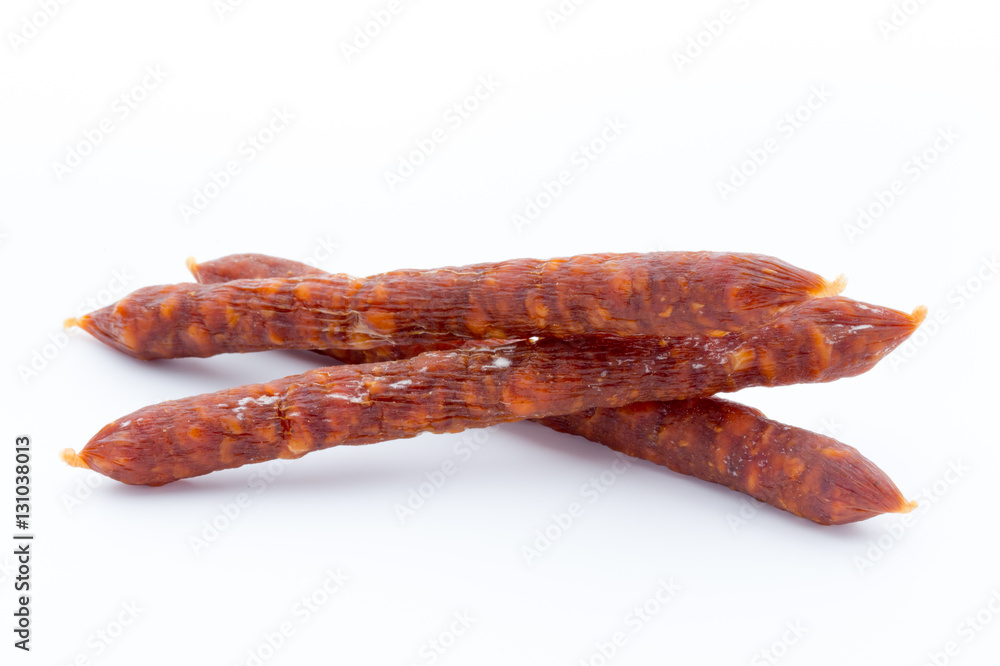 Smoked sausage salami isolated on a white background. Smoked sausage salami isolated on a white background.