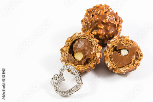 chocolate bean / Chocolate Candy, Truffle with heart pendant Valentine day concept isolated on white background.