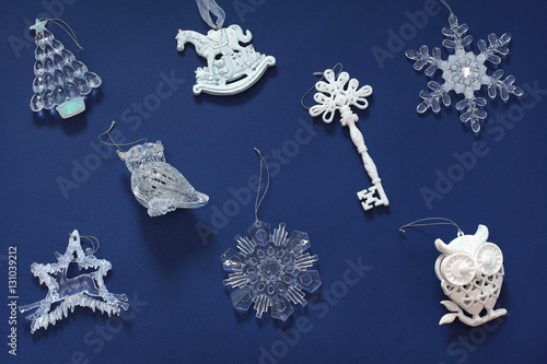 Fototapeta Naklejka Na Ścianę i Meble -  Christmas pattern with beautiful toys.  New year decorations on a dark blue background. Top view, flat lay