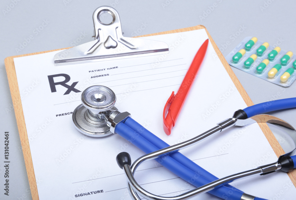 Stethoscope and red heart, isolated on white background Stethoscope and red heart, isolated on white background
