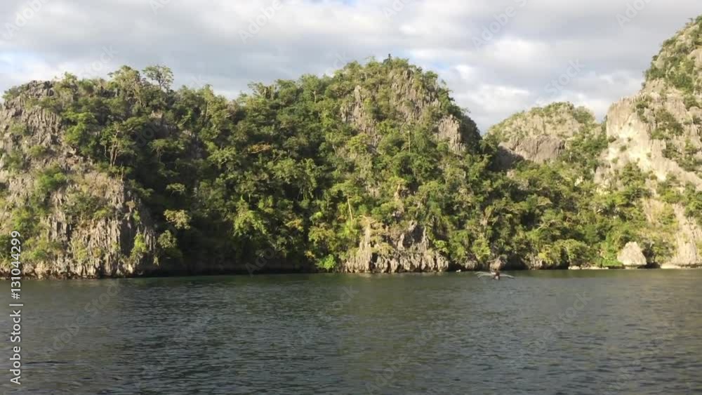 View on rocks and beautiful lagoon in the sea by El Nido in Philippines, Palawan . Rock and sea water.Beautiful landscape of tropical island (Philippines) View on rocks and beautiful lagoon in the sea by El Nido in Philippines, Palawan . Rock and sea water.Beautiful landscape of tropical island (Philippines)