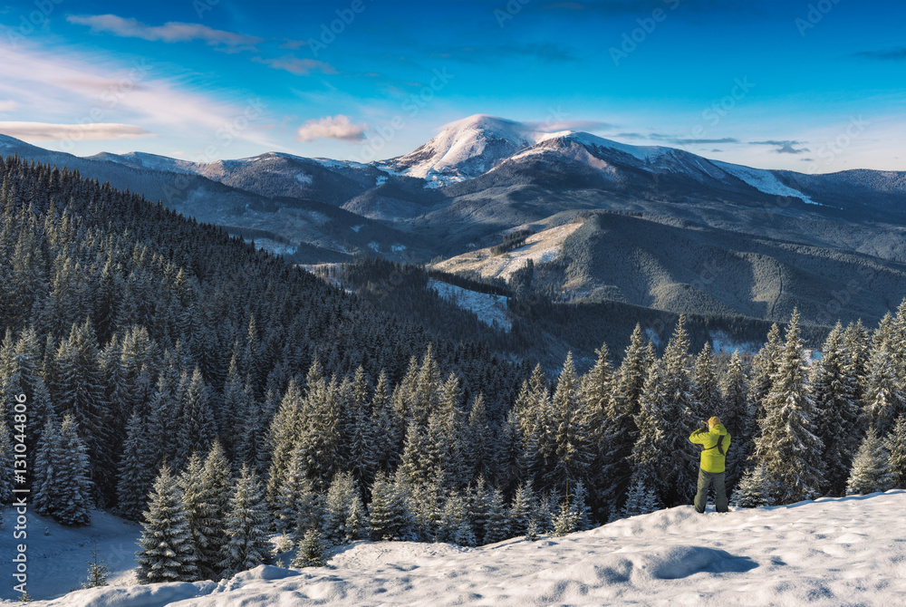 Photographer in a winter Carpathians