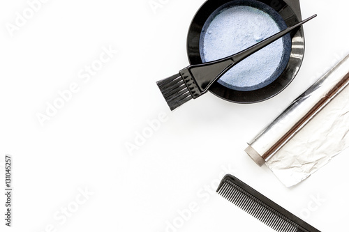 Tools for hair dye and hairdye top view white background