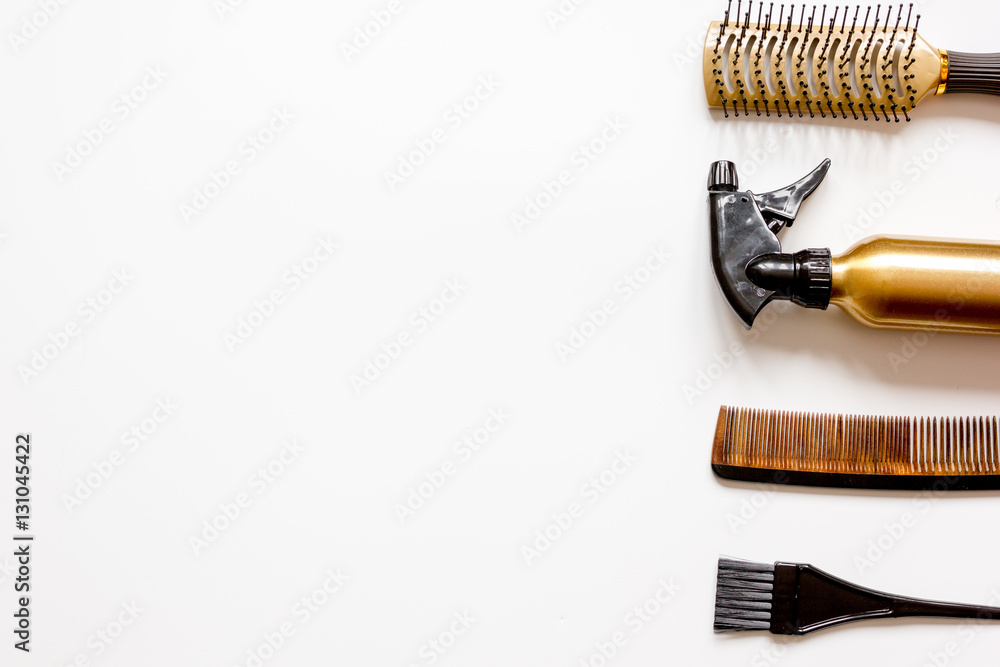 combs and hairdresser tools on white background top view combs and hairdresser tools on white background top view