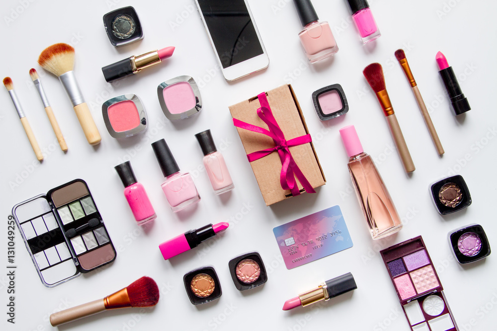 concept online shopping cosmetics on white background top view concept online shopping cosmetics on white background top view