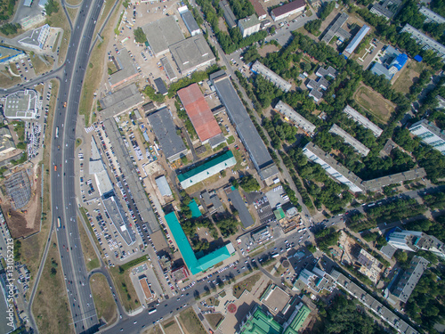 Aerial view of city Ufa from park, plant, buildings