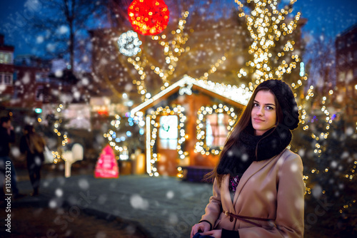 Pretty girl at Santa Claus House at Holiday Market