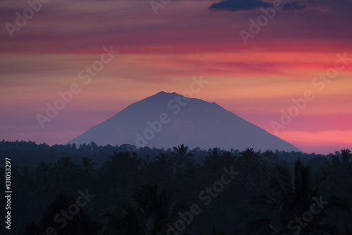 Mt. Batukaru. Gunung Batukaru, sometimes spelled Batukau, is Bali's second-highest mountain at 2,276 m. It is the highest peak in the Bedugul volcanic area, but is dormant. Photographed at sunrise.
