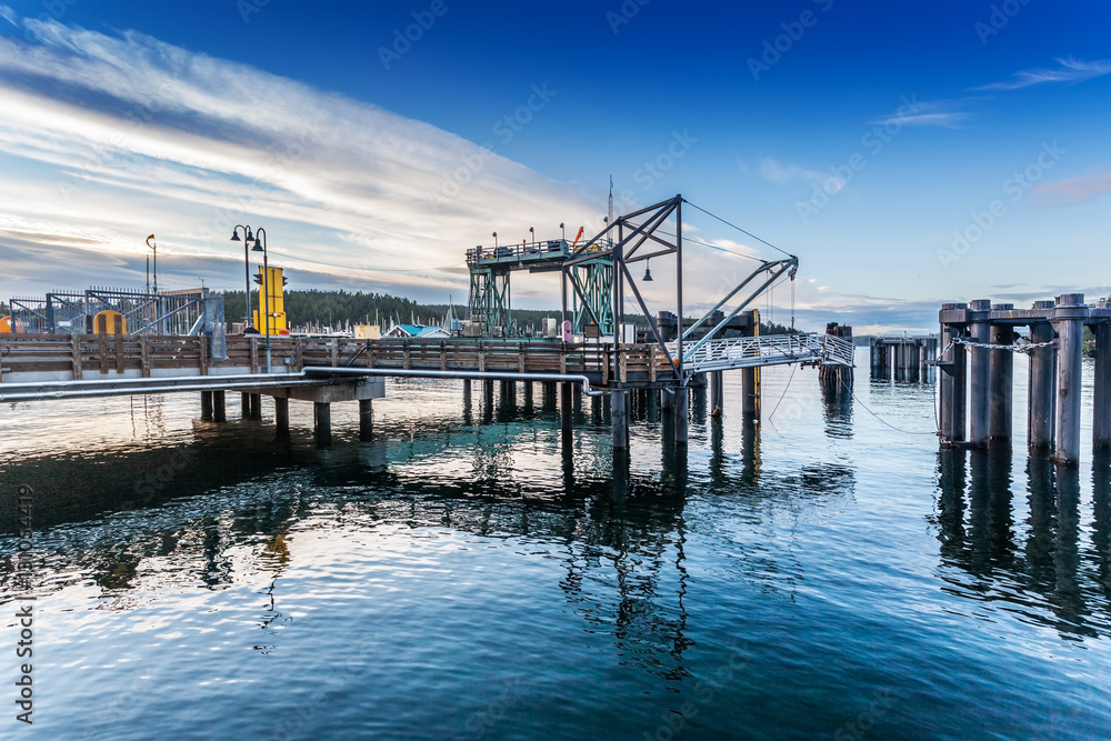 Ferry dock in Friday Harbor, San Juan Island, Washington on a summer evening, awaiting arrival of the last ferry of the day