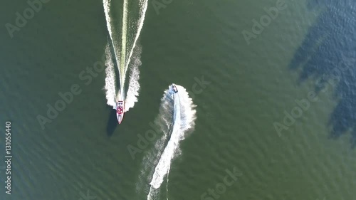 Boats on the lake seen from above drone video 4K