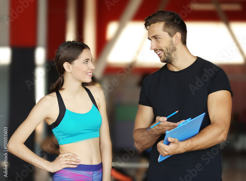 Woman with personal trainer...