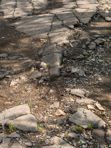 Wallpaper Mural Broken road with potholes. Torontodigital.ca