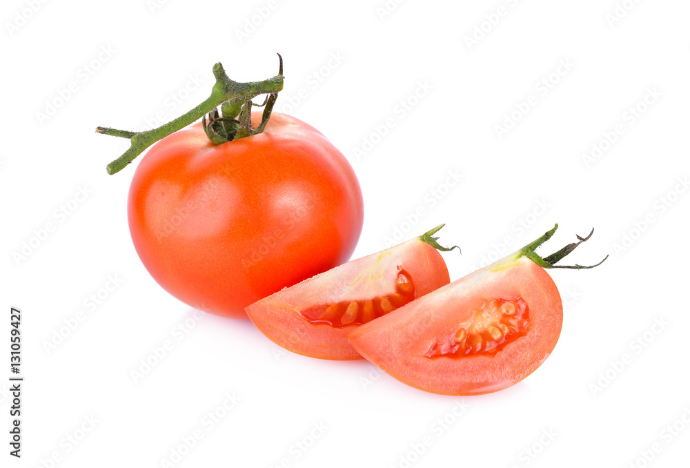 whole and cut fresh tomato on white background whole and cut fresh tomato on white background