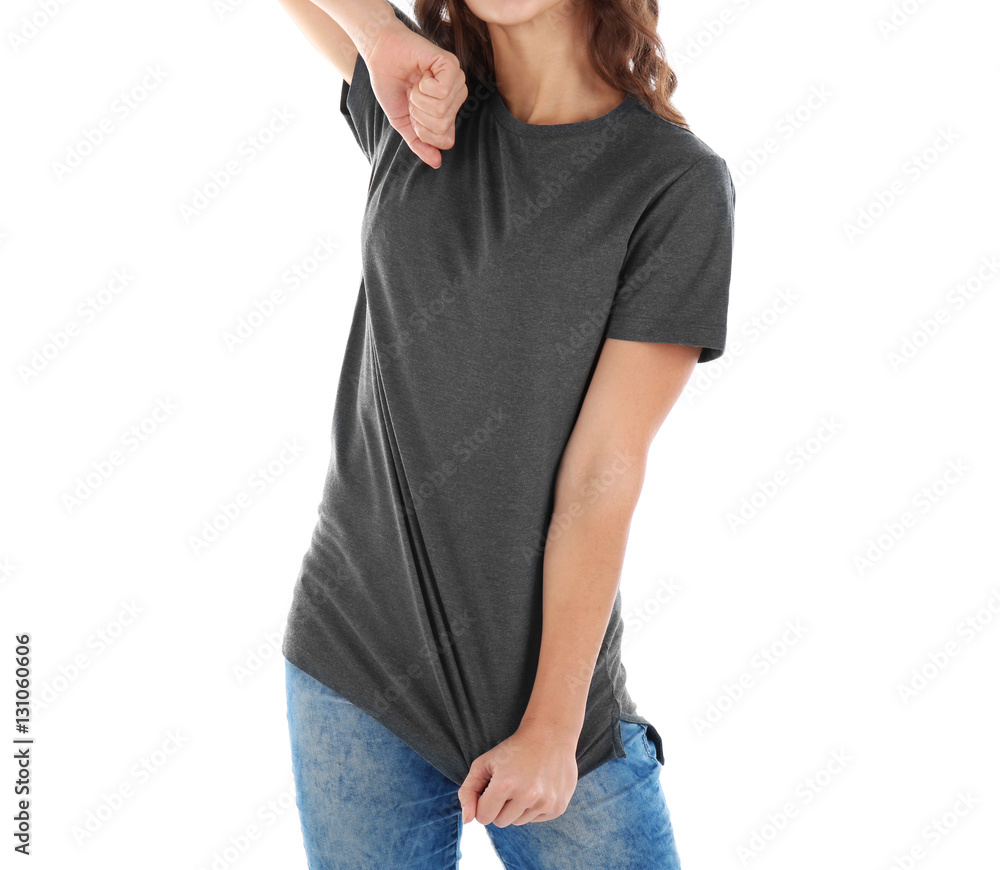 Young woman in blank grey t-shirt on white background, close up Young woman in blank grey t-shirt on white background, close up