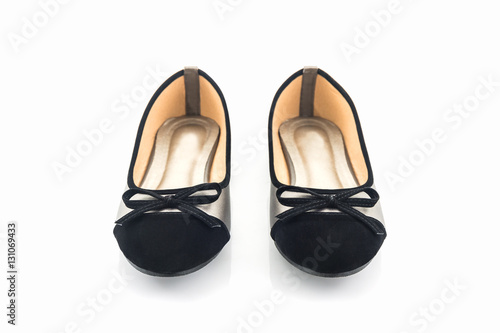 Black and gold color woman shoes.