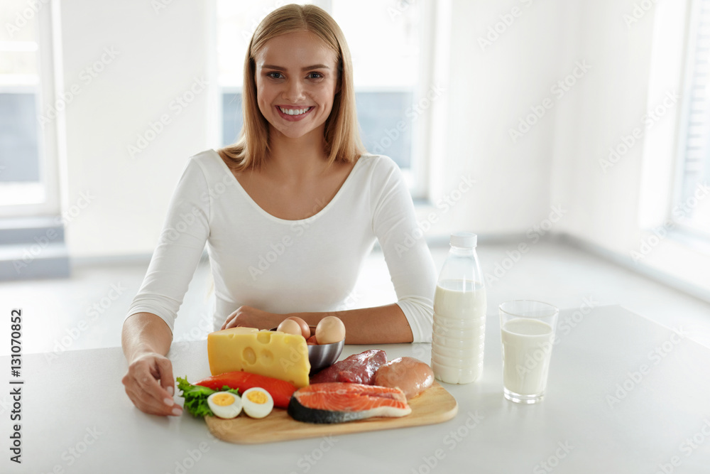 Healthy Nutrition. Beautiful Woman With Product In Kitchen. Food Healthy Nutrition. Beautiful Woman With Product In Kitchen. Food