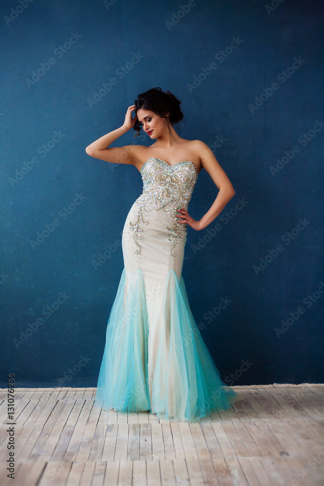Fototapeta premium Fashion photo of beautiful lady in elegant evening dress