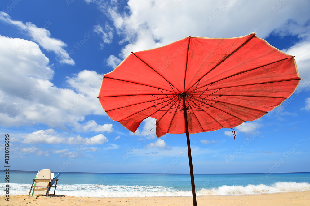 Beautiful sandy beach with umbrella 