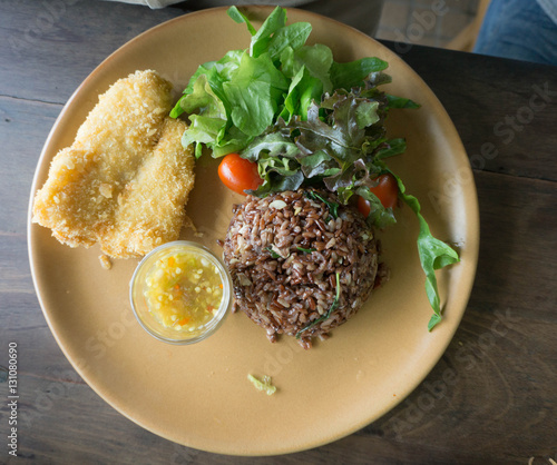 Deep Fried Dolly Fish Steak with sauce Stir basil crispy herb ho photo