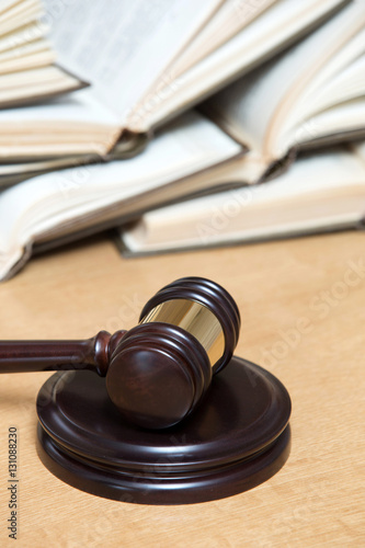 wooden gavel and books