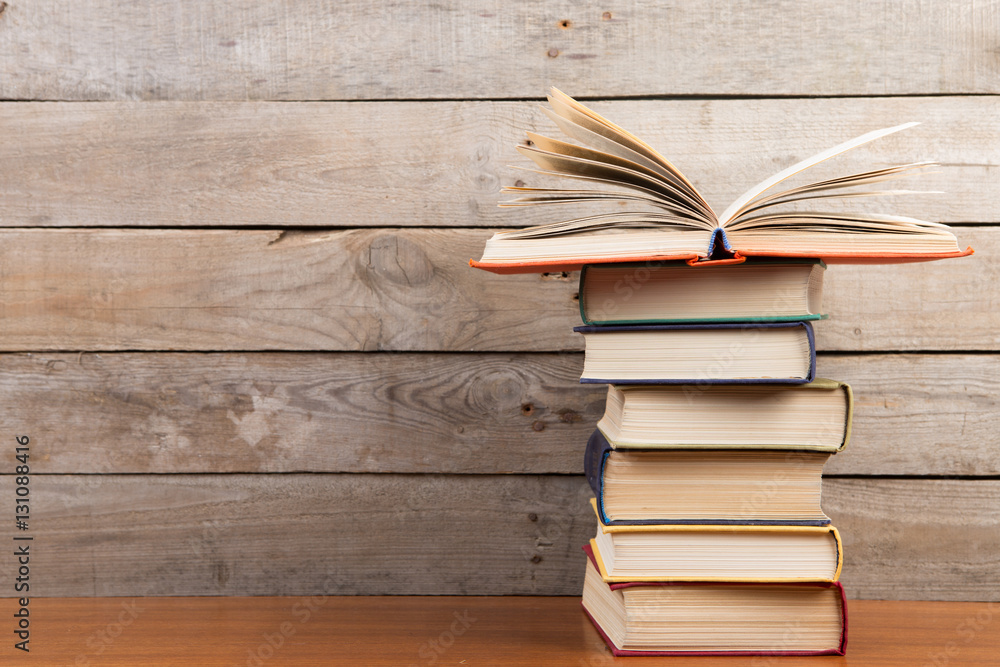 books on the wooden background books on the wooden background