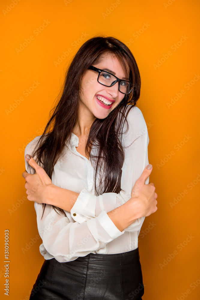 The young woman's portrait with happy emotions The young woman's portrait with happy emotions