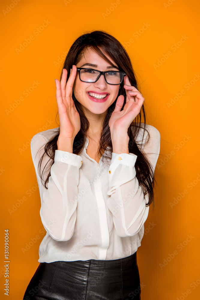 The young woman's portrait with happy emotions The young woman's portrait with happy emotions