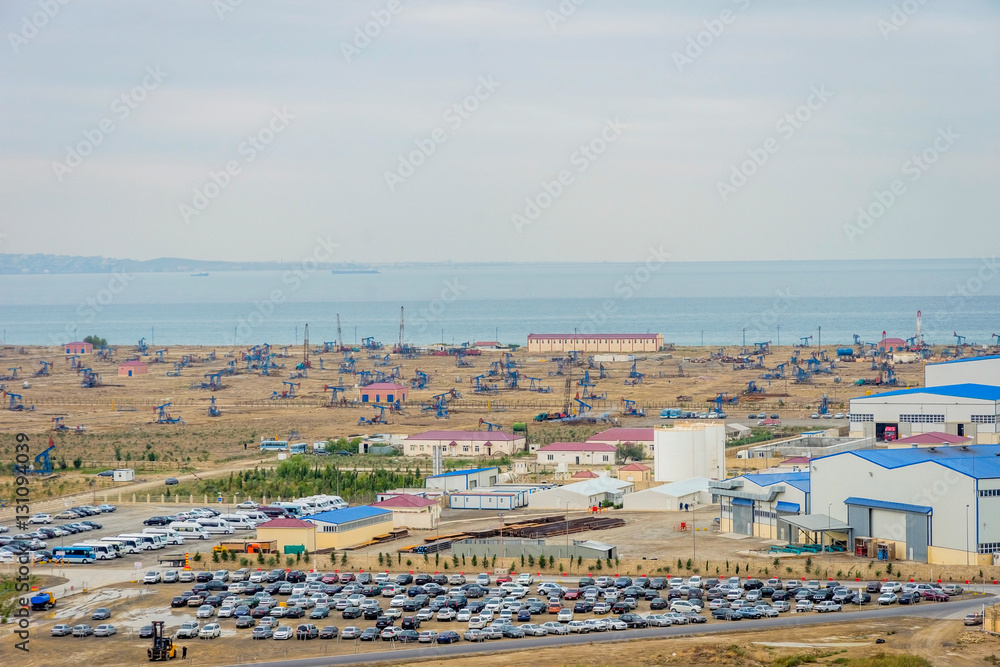 Oil pumps and rigs by the Caspian coast Oil pumps and rigs by the Caspian coast