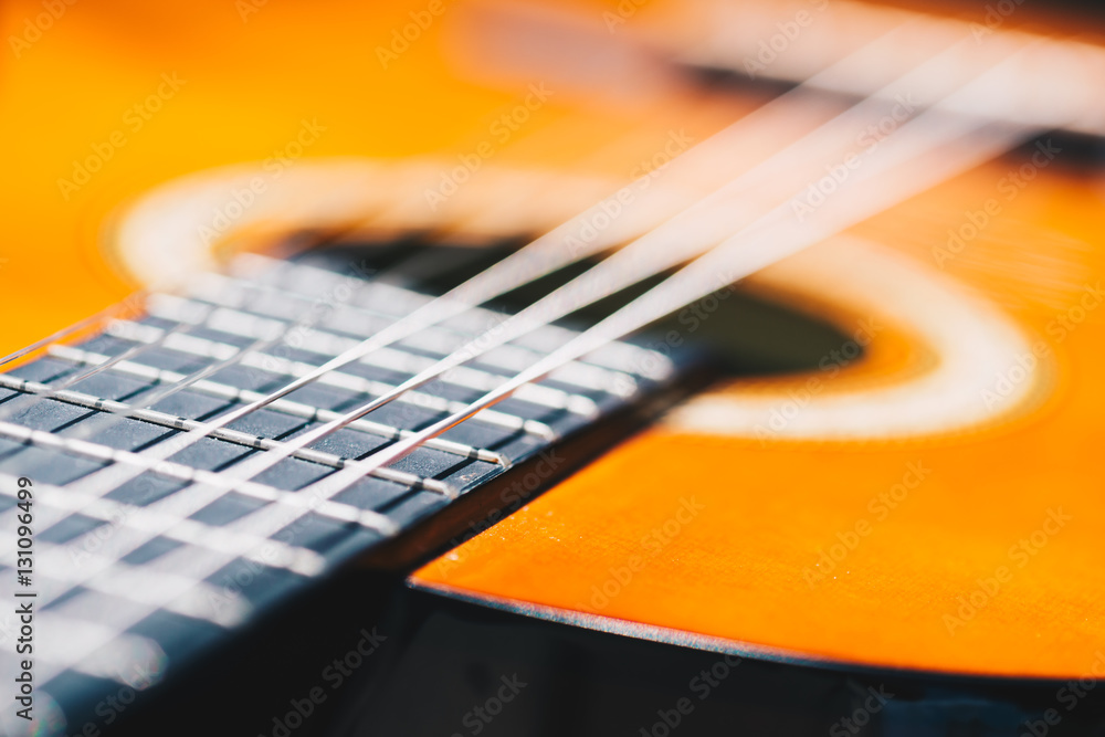 Fototapeta premium Detail of classic guitar with very shallow depth of field