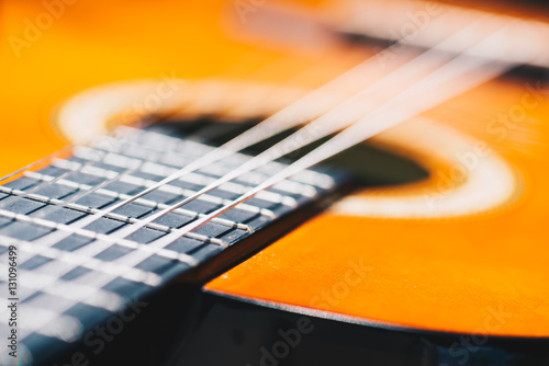 Detail of classic guitar with very shallow depth of field