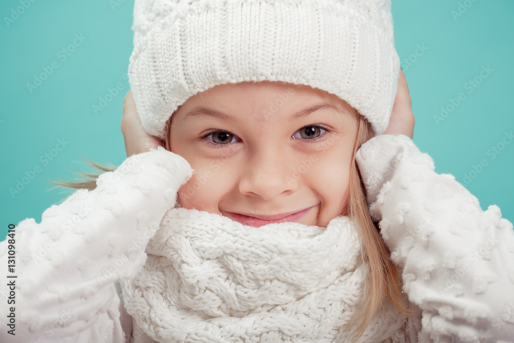 portrait of a little girl in white hat and scarf portrait of a little girl in white hat and scarf