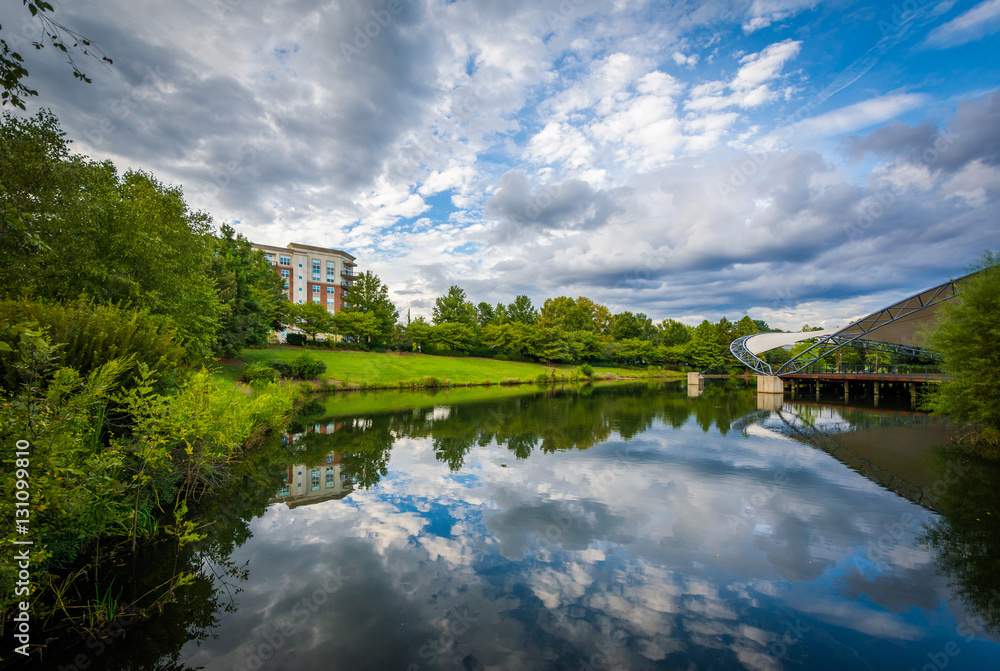 Dramatic sky over the lake at Symphony Park, in Charlotte, North