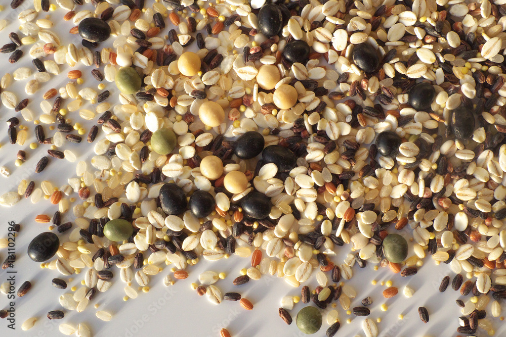 Fototapeta premium Cereals and beans on wood background