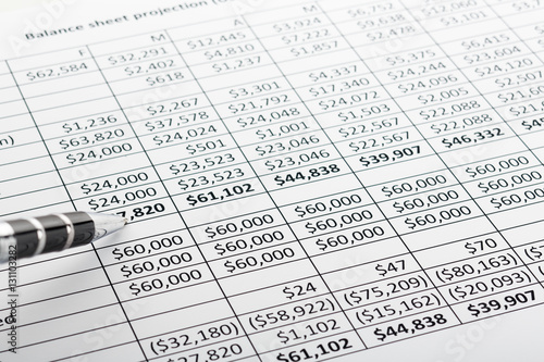 Close up of finance business sheet with pen