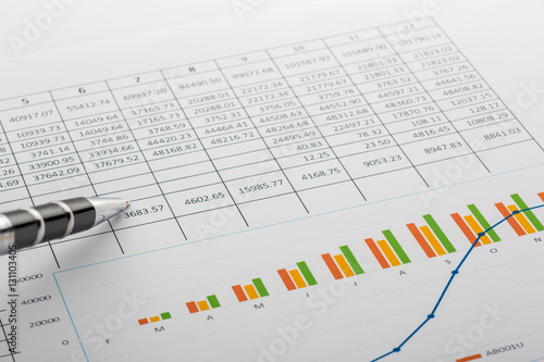 Close up of finance business sheet with pen