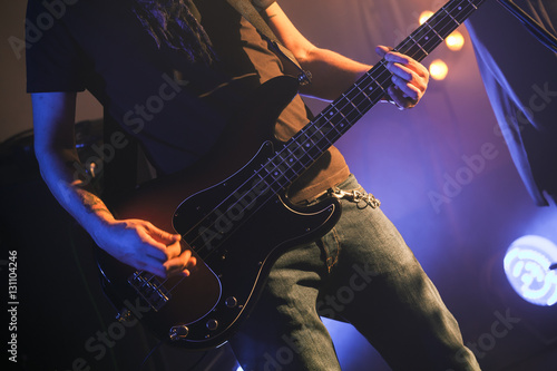 Electric bass guitar player, closeup
