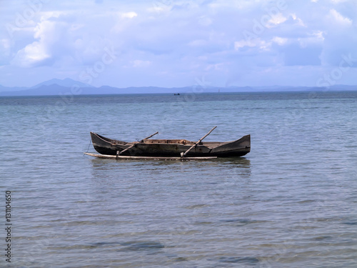 traditional boat carved from a tree trunk, Nosi Be, Madagascar,