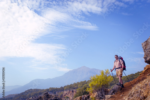 Hiking in the mountains in the summer on a sunny day.