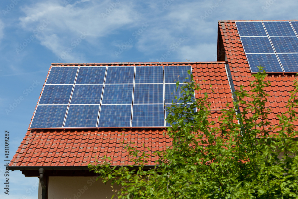 Fototapeta premium solar cell system on the roof of a living house in the sun