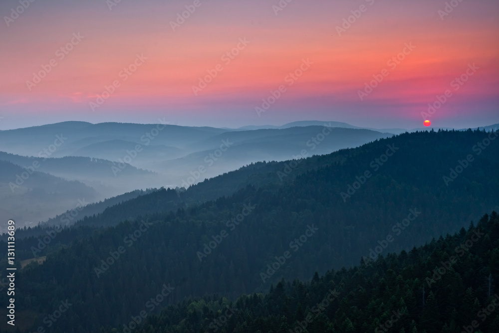 Piękny wschód słońca w górskim mieście Muszyna. Beautiful sunrise  in the mountain in Muszyna - Poland. Polish mountain landscape.