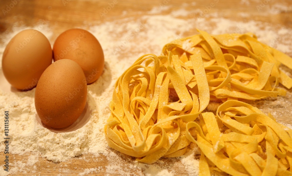 macro photograph of three eggs with flour and fresh homemade ita macro photograph of three eggs with flour and fresh homemade ita