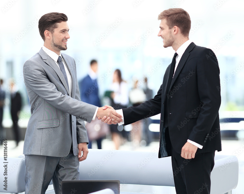 Business people shaking hands during a meeting