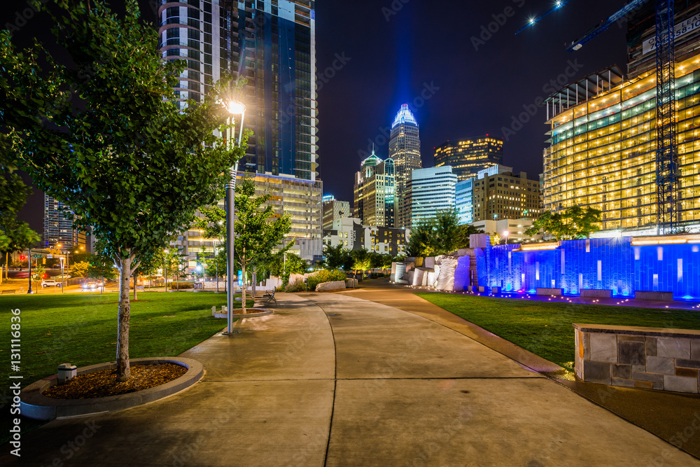 Walkway and modern buildings at night, seen at Romare Bearden Pa