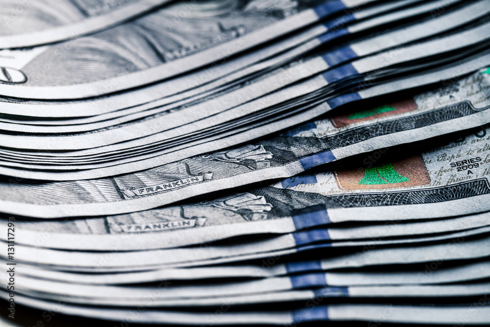 money on a wooden background. lot 100 dollars, business composition money on a wooden background. lot 100 dollars, business composition