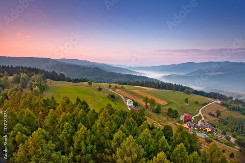 Piękny wschód słońca w górskim mieście Muszyna. Beautiful sunrise in the mountain in Muszyna - Poland. Polish mountain landscape