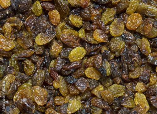 Background dried raisin grapes close up shot