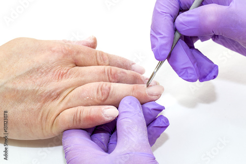 process of women s manicure in a beauty salon