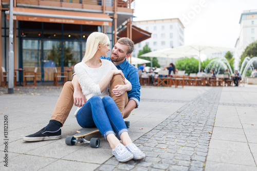 couple sitting on skateboard in Magdeburg