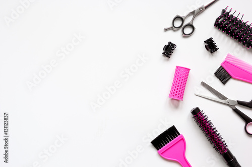 preparations for styling hair on white background top view